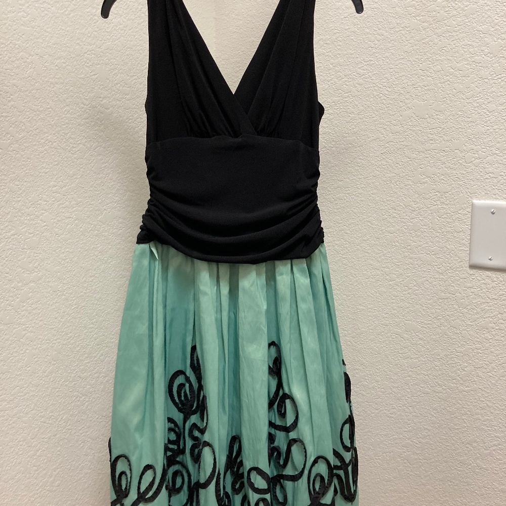 Black and green cocktail dress